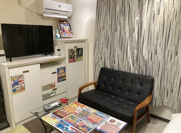 ホテルシルフ 112号室のテレビ・ソファ側